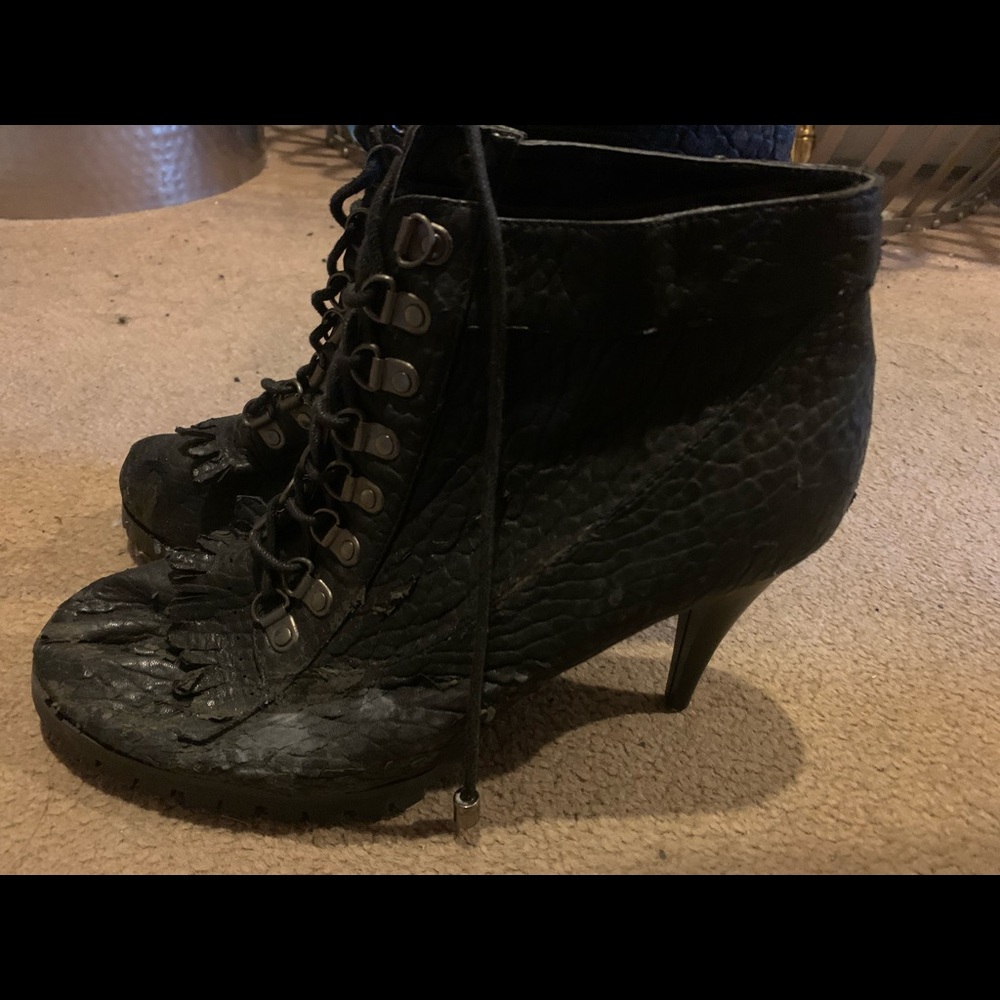 Black heel boots.